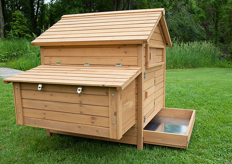 The Bungalow Chicken Coop includes a slide out droppings tray for easy cleaning. 