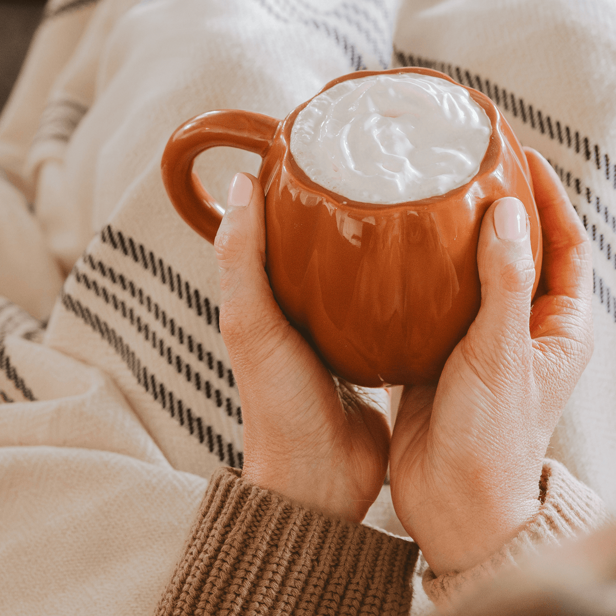 Orange pumpkin-shaped 19 oz ceramic coffee mug