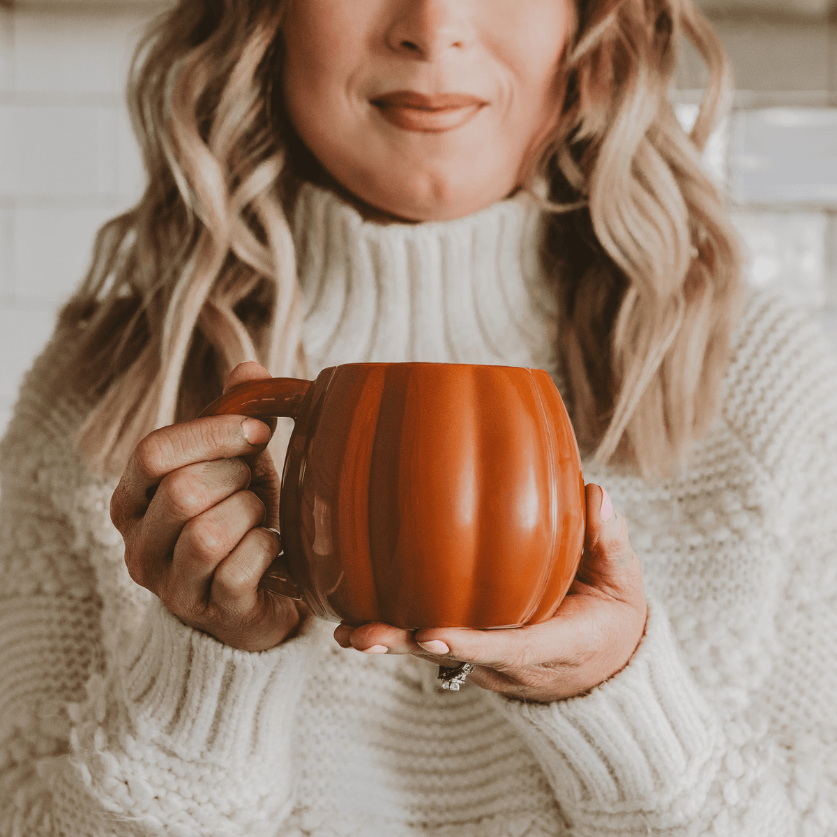 Orange pumpkin-shaped 19 oz ceramic coffee mug