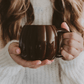 Brown pumpkin-shaped 19 oz ceramic coffee mug
