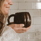 Brown pumpkin-shaped 19 oz ceramic coffee mug