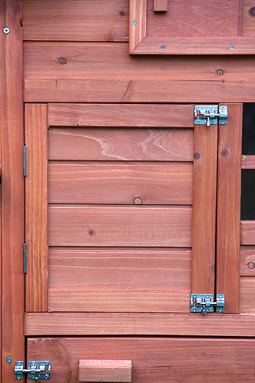 Door with locks on the Clubhouse Chicken coop