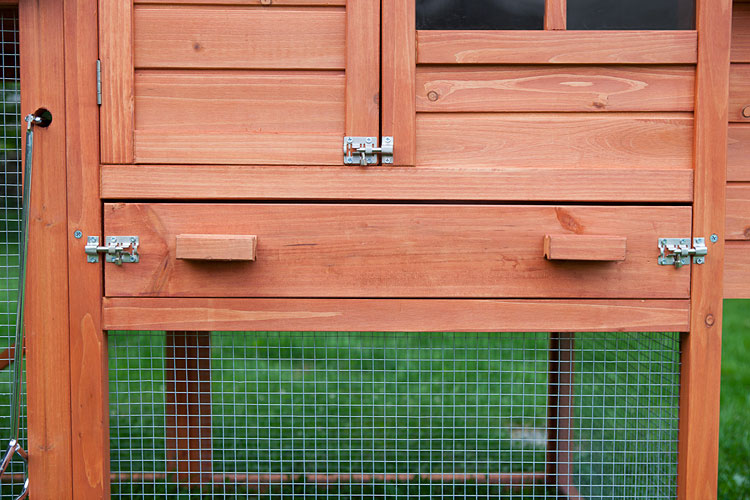 The Clubhouse Chicken Coop is easy to clean with the pull-out droppings tray. 