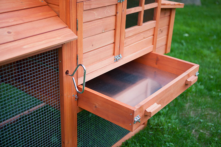 The Clubhouse Coop includes an extra deep droppings tray that actually work, lined with galvanized metal.