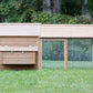 An optional covered run offers additional space for the Bungalow Chicken Coop.