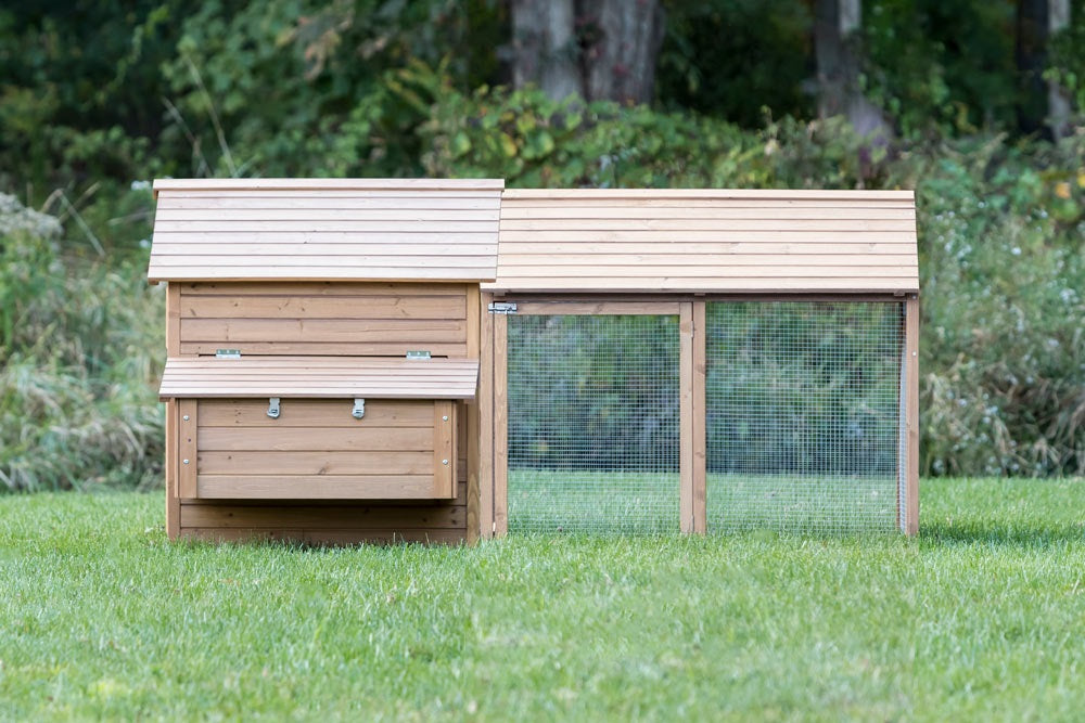 An optional covered run offers additional space for the Bungalow Chicken Coop.